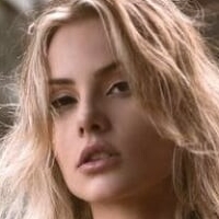 Де Мартини Голая